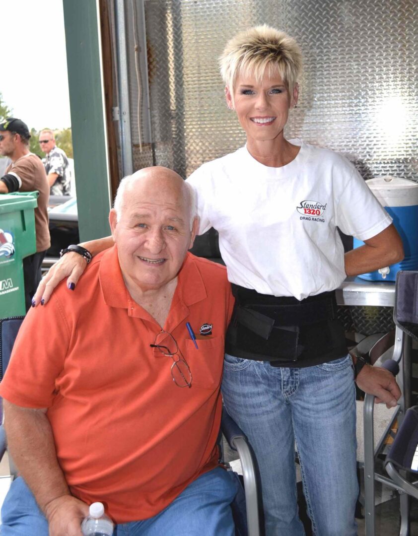 A picture of a woman and a man posing for a picture